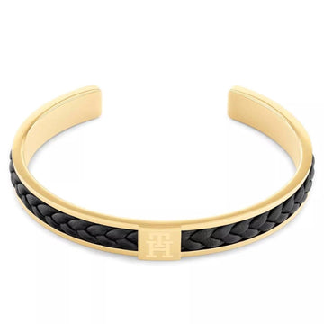 Ανδρικό βραχιόλι χειροπέδα Tommy Hilfiger από ατσάλι σε χρυσό χρώμα με μαύρο δέρμα.